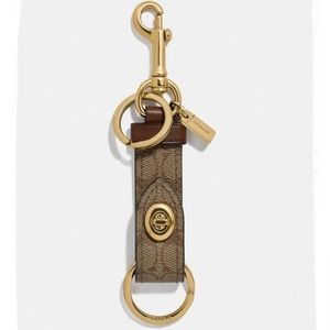 Coach Trigger Snap Bag Charm In Signature Canvas
